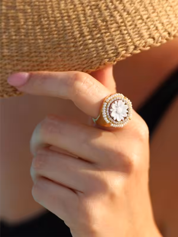 Model wearing large pearl Ring